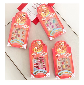 Detailed view of kids cartoon press-on nails with Chinese New Year koi and lucky symbols
