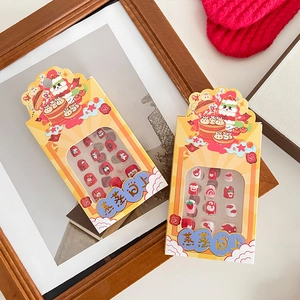 Red cartoon New Year press-on nails for kids with festive strawberry and heart patterns