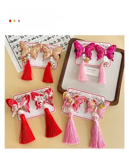 Detail of embroidered butterfly hair clips with pearls and tassels for Chinese Hanfu