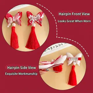 Traditional red fabric butterfly hair clips with white pearls and long tassels for girls