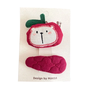 Handmade red apple and quilted oval hair clips set for girls on display card