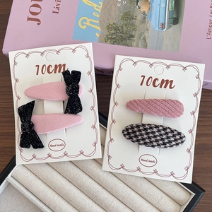 Pink fabric bow hair clip set for girls with cute houndstooth and matte patterns