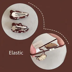 Simpatici fermagli per capelli a forma di orso marrone e set di elastici con orsetto peluche