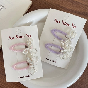 Handmade sweet pearl bow hair clips set for women in elegant pink and purple fabric style
