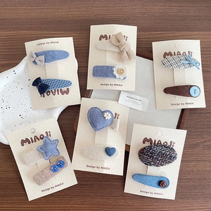 Set of 6 cute blue fabric hair clips for girls featuring bows and floral designs