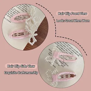 Handmade pink ribbon bow hair clips set with imitation pearls and sweet fabric finish