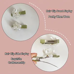Sweet white flower hair clips for girls with green satin ribbon and pearl-like finish