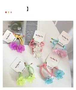 Detailed close-up of colorful matte floral hair ties with high elasticity and sweet style