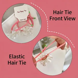 Pink elastic hair ties with creamy resin flower petals and handmade woven cord for girls
