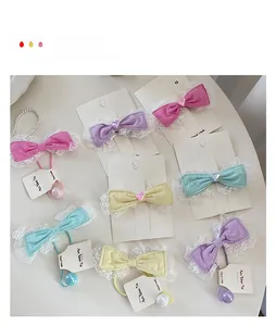Colorful kids candy lace bow hair clips and matching elastic bands set in macaron tones