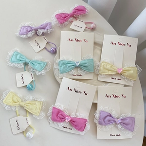 Handmade lace bow hair clips with heart gems in sweet candy colors for girls