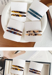Detail of French acetate hair clips in tortoiseshell and marble patterns on display