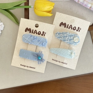 Blue tweed hair clips set with lace and rhinestones for girls on display card