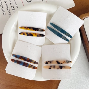 French acetate leaf hair clips set in tortoiseshell and marble patterns for women