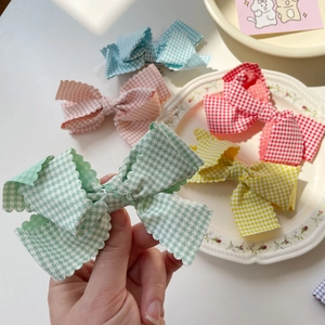 Sweet plaid bow hair clips with ruffled edges in assorted pastel colors for women
