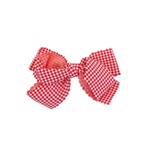 Red and white plaid bow hair clip with scalloped edges for girls on white background