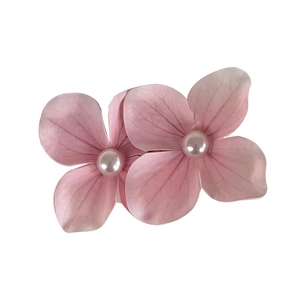 Set of two pink orchid hair clips with white pearls and translucent resin petals