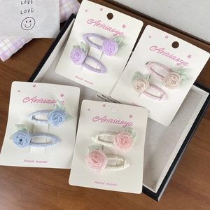 Lot de quatre barrettes à fleurs de camélia faites main en tissus pastel variés