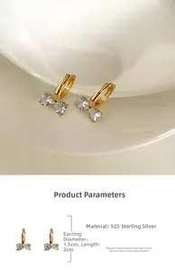 Detailansicht der 925 Silber 18K Gold Creolen mit Zirkonia-Schmetterlingsanhängern