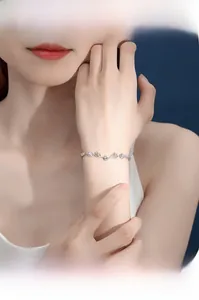 Close-up of S925 silver deer antler bracelet with zircon stone on woman wrist