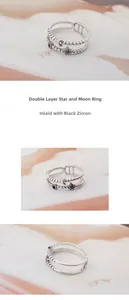Detailed macro view of double-layer ring with black zircon star and moon design