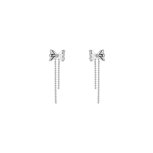 Silver bow earrings with cascading tassel chains and central diamond inlay on white background