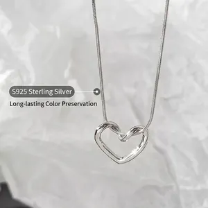 Minimalist S925 sterling silver hollow heart necklace with elegant silver snake chain