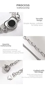 Detail view of S925 sterling silver chain featuring a black enamel heart charm and clasp