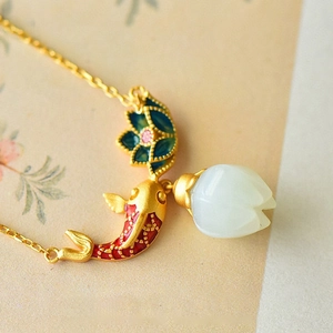 Vintage Chinese style necklace featuring gold koi carp and white jade lotus flower pendant