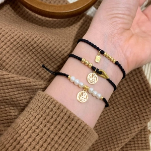 Handmade black cord bracelet with gold Fu pendant and pearls for couples and women