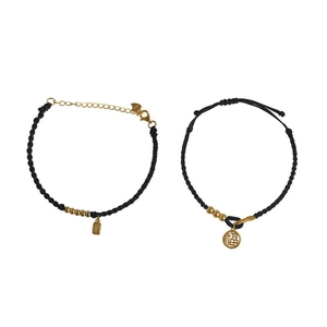 Gold Fu charm bracelets with black braided cords and adjustable lobster clasp for couples