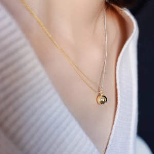 Minimalist gold ball pendant necklace with two-tone mixed metal chain for women