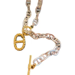 Collier chaîne ancre bicolore or et argent avec fermoir à bascule OT torsadé chic