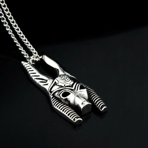 Vintage silver Anubis pendant necklace in hip hop style with embossed steel mask detail