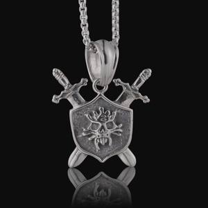 Macro view of gothic shield and crossed swords pendant with dark skull relief details