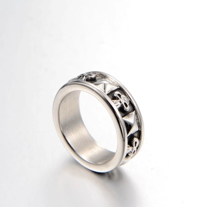 Punk style spinning titanium steel ring with skull and pyramid rivet relief motifs