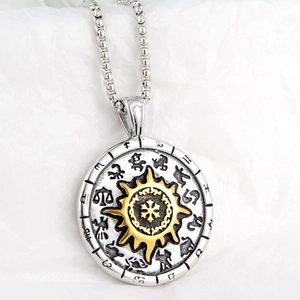 Vintage sun pendant necklace with silver totem ring and gold sunburst on box chain