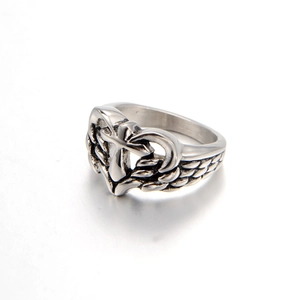 Vintage stainless steel cross ring with wings and oxidized punk style finish