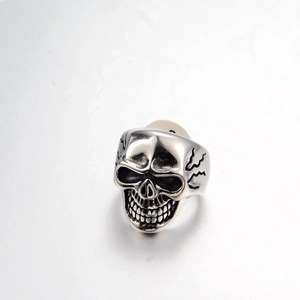 Vintage silver skull ring with lightning detail in punk rock stainless steel style