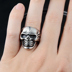 Gothic skull ring in vintage stainless steel with aged finish and carved side details