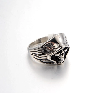 Gothic skull ring made of vintage hooded titanium steel with oxidized finish for unisex wear