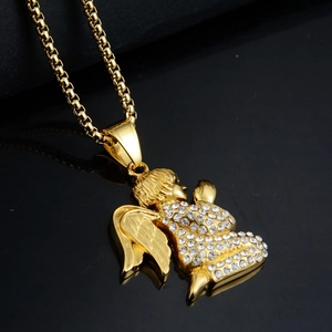 Detail of hip hop angel pendant in gold finish with sparkling cubic zirconia on box chain