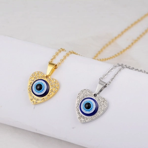 Hip hop evil eye heart pendant necklaces in gold and silver with white rhinestones