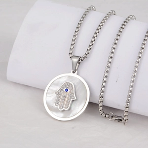 Hip hop style Hamsa hand pendant necklace in stainless steel with crystal eye and shell base