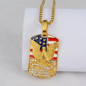 Detail of gold eagle pendant with American flag enamel and sparkling rhinestones