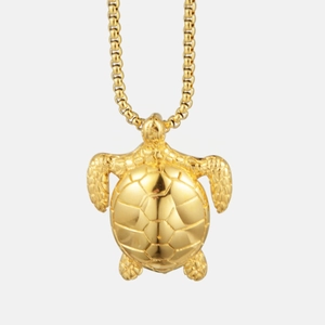 Polished gold sea turtle pendant necklace with detailed shell and round box chain