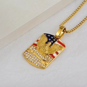 Detail of golden eagle pendant with US flag and sparkling crystals on bead chain