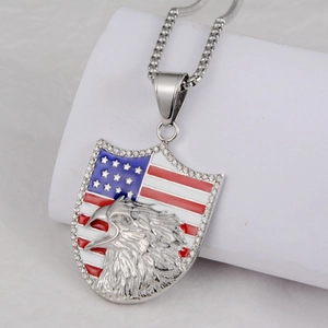 Detail of shield pendant with eagle relief and American flag enamel inlay