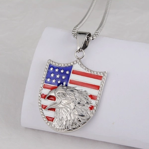 Close-up of eagle shield pendant with USA flag enamel and rhinestone inlay