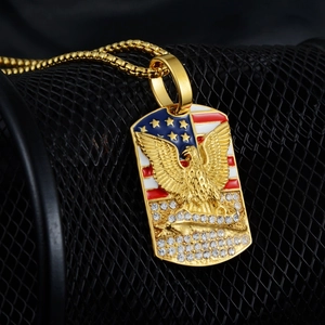 Detailed close-up of eagle military dog tag pendant with American flag and crystals